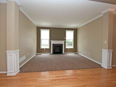 Living Room. The living room features upgraded wal