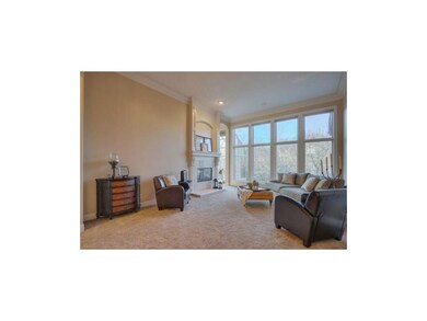 FLOOR TO CEILING WINDOWS ACCENTUATE NATURAL LIGHT.
