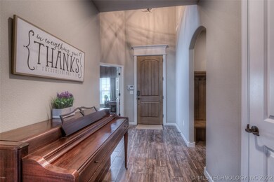 Looking at the entry from the living, stairs to th