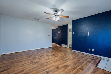Empty room featuring hardwood / wood-style floors 