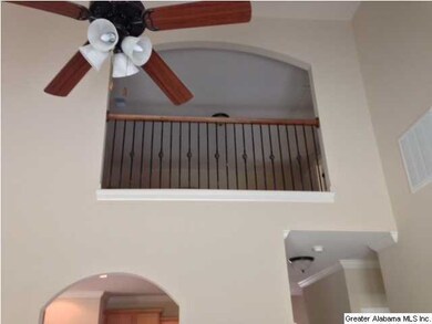 two story family room with loft overlook above