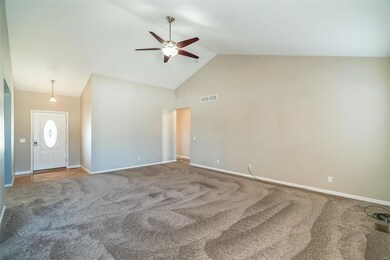Family room looking into the foyer and hallway to 