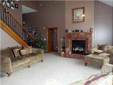View from the kitchen/breakfast nook area. Firepla
