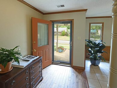 A tiled entry brings you into this move-in ready t