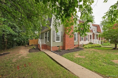 View of property exterior with crawl space and a lawn