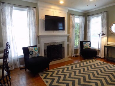 DEN WITH FIREPLACE AND GAS LOGS. SO MUCH NATURAL LIGHT.