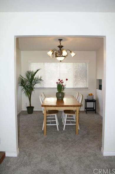 Formal Dining Room Off of The Living Room With Kit