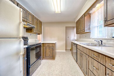 The kitchen is the hub of the house affording acce