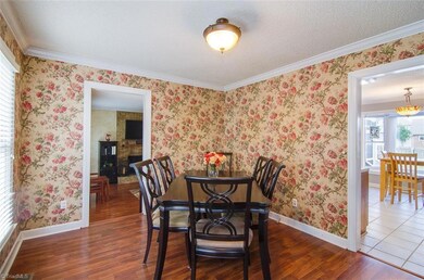 Dining room with easy access to kitchen and family room.