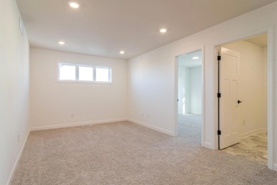 (*Photo of similar home, actual homes colors and finishes will vary) The upper level loft is a great space for additional living space, a game room, or playroom!