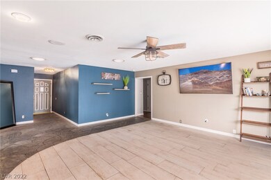 Living room looking at doorway to separate bedroom