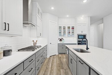 Kitchen featuring light hardwood / wood-style floo