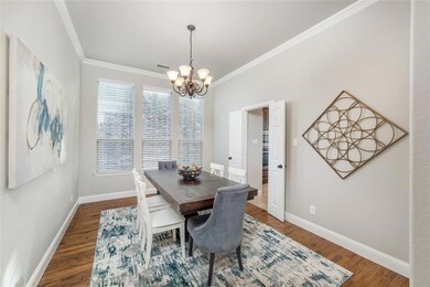 Perfect formal dining space w crown molding.