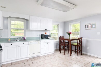 Sellers have refaced the kitchen cabinets, new har