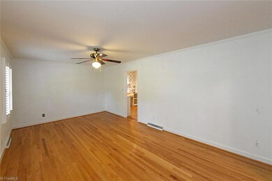 Living Room is spacious and has lots of wall space for your creativity