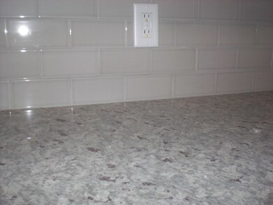 granite counter + backsplash