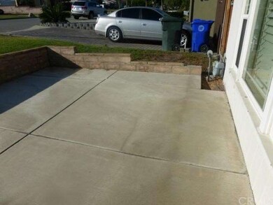 VIEW OF CONCRETE SLAB FRONT ENTRANCE
