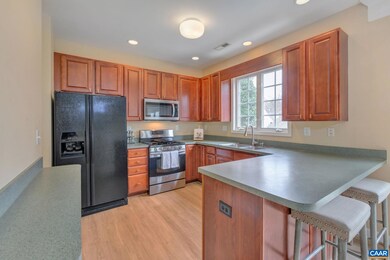 5-burner gas stove, ample cherry cabinetry, newer 