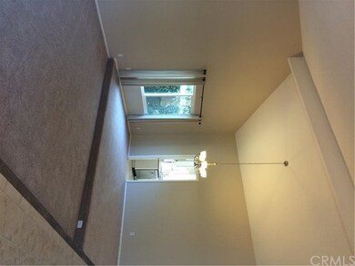 Open floor plan living and dining room with valued