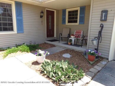 6403 E Millsborough Cir, Lansing, MI 48917 - photo 2