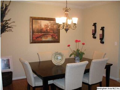 Spacious dining room with hardwood floors