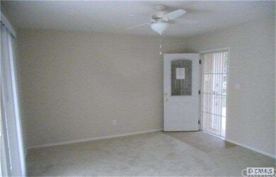 Spacious living room with wall furnace