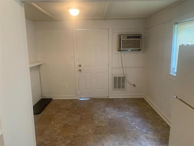 Entryway with a wall unit AC