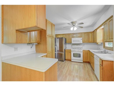 Spacious Kitchen, newer cabinets, stainless refrig