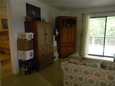 Tiled Floor Throughout Condo for Easy Cleaning!  Sliding Glass Doors to Private Rear Deck