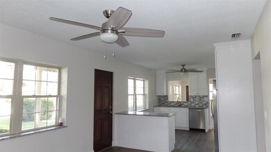 Living room view to kitchen