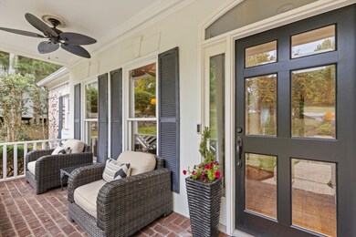 The quintessential rocking-chair front porch is spacious, quiet and welcoming.