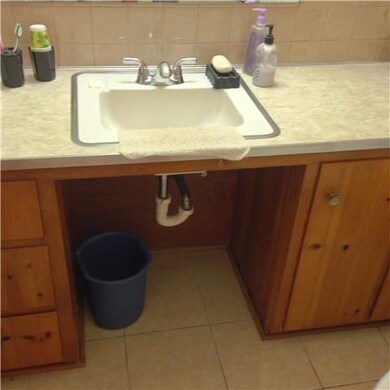 Half bath attached to master bedroom.