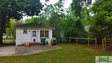 Large fenced backyard with lots of potential.