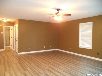 Another view of family room looking into hallway to two of the bedrooms.