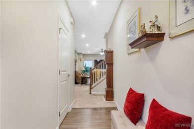 entrance into Large living area with 1/2 bath