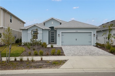 Ranch-style home featuring driveway, an attached g