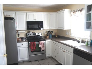 Eat-in kitchen with stainless steel oven and dishw