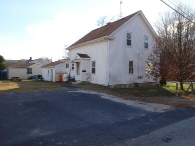 Exterior Front. Rear Driveway and Back Yard