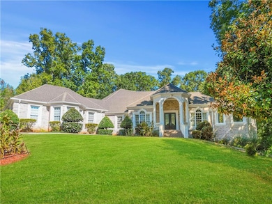 Ranch-style house with a front yard