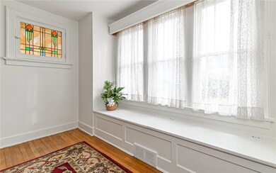 Dining room also is accompanied with two stained g