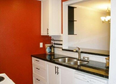 Kitchen open to dining area ~ perfect for entertai