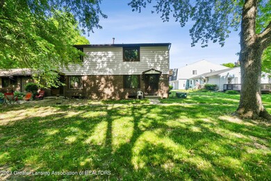 3940 Hunters Ridge Dr unit 3, Lansing, MI 48911 - photo 3