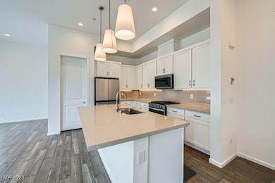 Kitchen with appliances with stainless steel finis