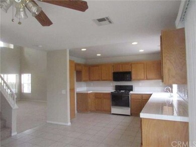 South Corona: Tile flooring and lots of cabinets