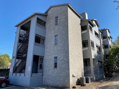 View of property with central AC
