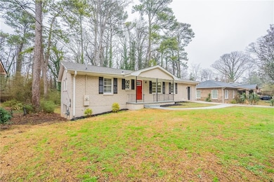 Ranch-style house with a front lawn and a porch