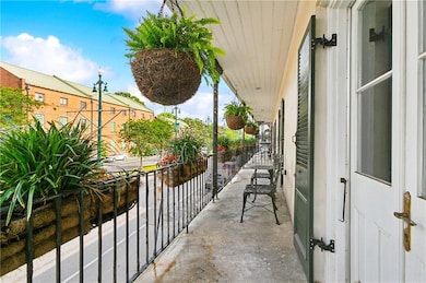 2nd floor unit w/ Wide Balcony overlooking Rampart