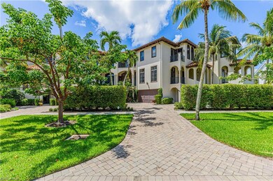 Mediterranean / spanish-style house with a balcony and a front yard