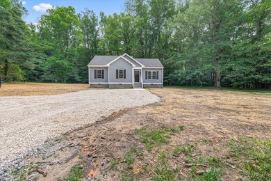 View of front of home featuring crawl space and gr