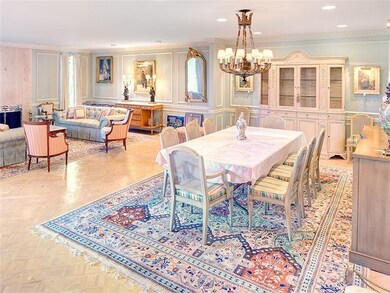 Dining and living rooms. Bleached parquet wood flo